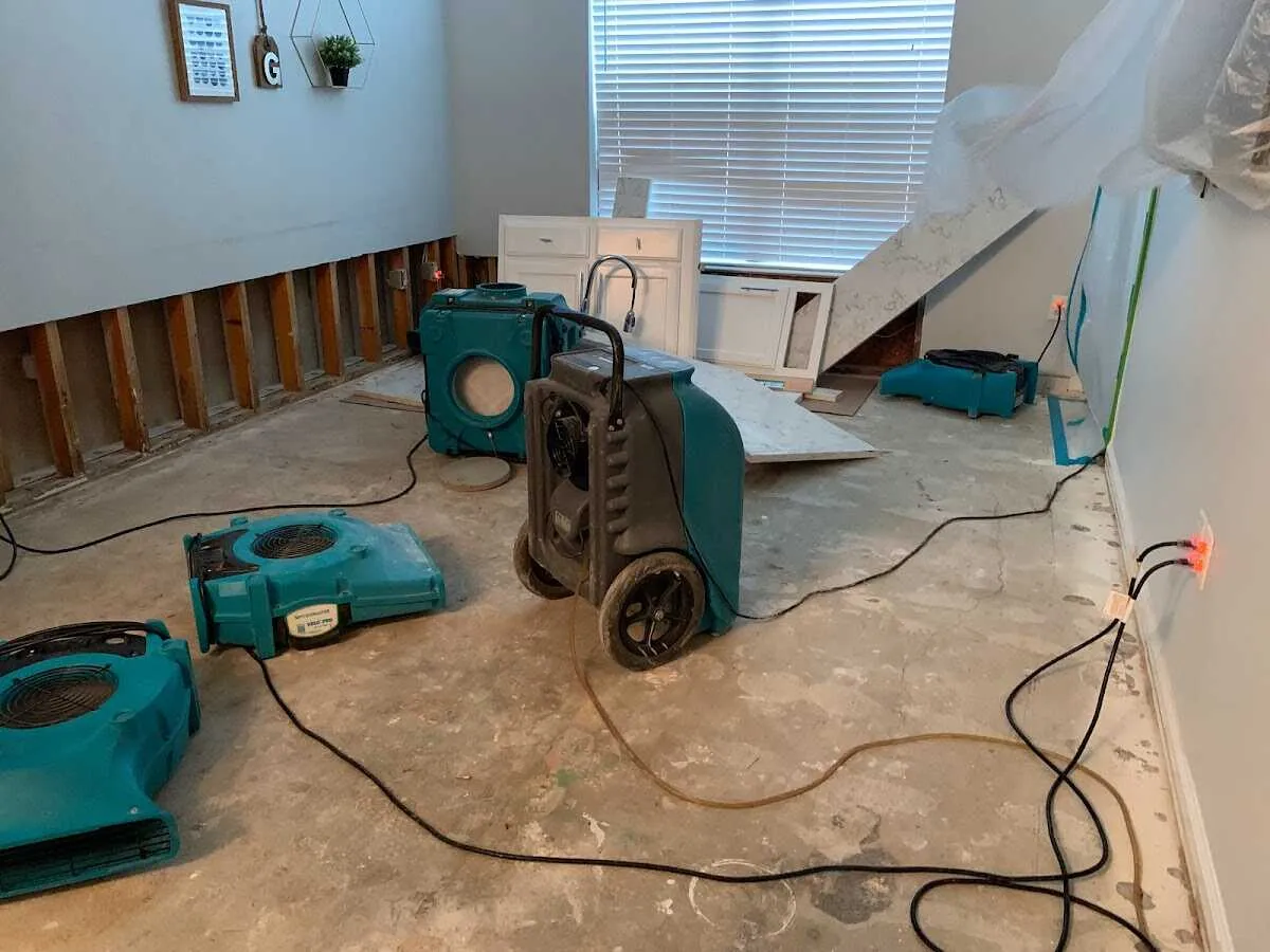 Dehumidifier in flood-cut room for Water Damage Restoration in Gering